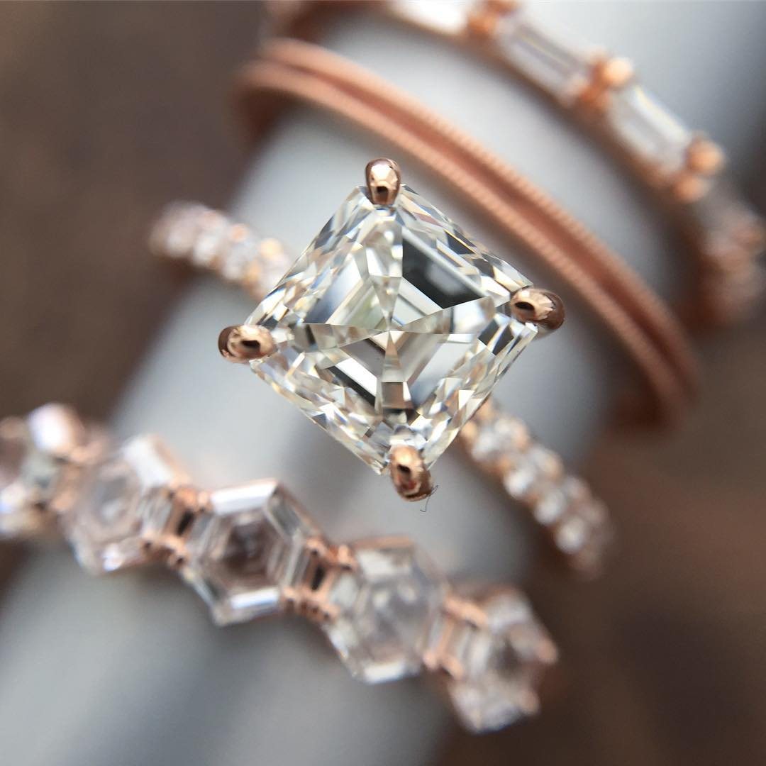 The ring stacked with two fine bands, photographed at an angle.